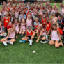 Xcelerate-lacrosse-girls-group-shot-coach