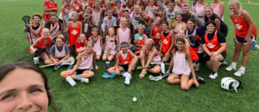 Xcelerate-lacrosse-girls-group-shot-coach