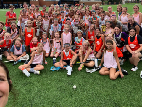 Xcelerate-lacrosse-girls-group-shot-coach